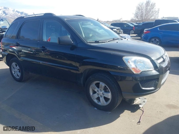2009 Kia Sportage LX with VIN KNDJF724697560072, listed as a IAAI auction lot 41772234 with 157,914 mi miles. Bid and sale history available at carsss.com. Image 1.