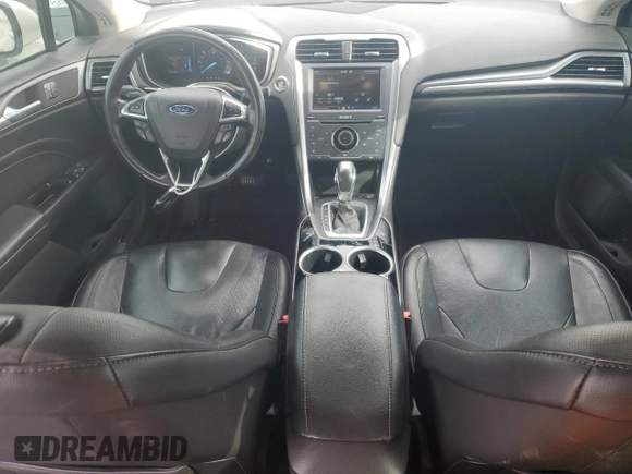 2013 Ford Fusion Titanium Hybrid с VIN 3FA6P0RU3DR282013, выставлен на аукционе Copart как лот 53651595 с пробегом 133 214 миль миль и Списание • Salvage title. История ставок и продаж доступна на DreamBid. Изображение 8.