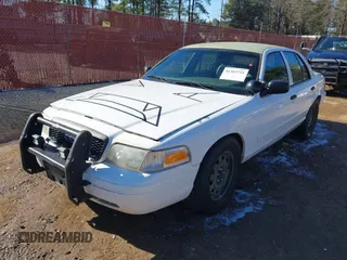 2005 Ford Police Interceptor z VIN 2FAFP71WX5X164985, wystawiony jako IAAI lot #41363721 z przebiegiem 147 950 mil mil oraz . Historia ofert i sprzedaży dostępna na DreamBid. Obrazek 2.