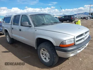 2003 Dodge Dakota Sport with VIN 1D7HG38N63S321703, listed as a IAAI auction lot 41807402 with 252,984 mi miles and . Bid and sale history available at carsss.com. Image 1.