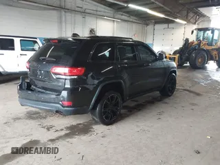 2015 Jeep Grand Cherokee Limited with VIN 1C4RJFBG4FC611156, listed as a IAAI auction lot 42021705 with 137,887 mi miles. Bid and sale history available at carsss.com. Image 4.