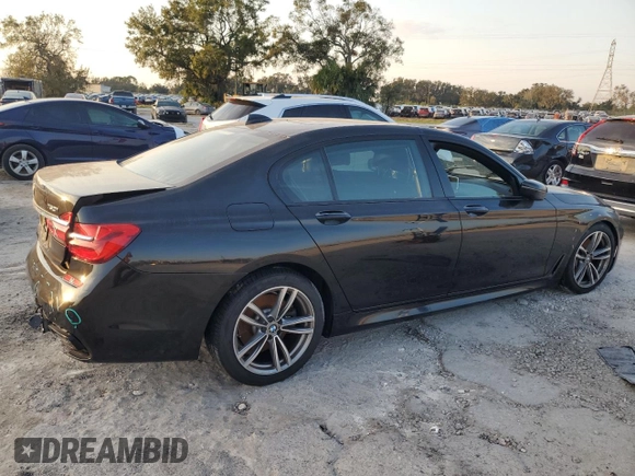 2018 BMW 7 Series 750i with VIN WBA7F0C5XJGM22674, listed as a Copart auction lot 74833524 with 0 mi miles and Salvage Title. Bid and sale history available at carsss.com. Image 3.