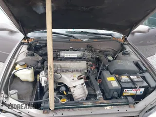 1994 Toyota Camry LE z VIN 4T1SK12E0RU463582, wystawiony jako IAAI lot #41823733 z przebiegiem 120 050 mil mil oraz . Historia ofert i sprzedaży dostępna na DreamBid. Obrazek 10.