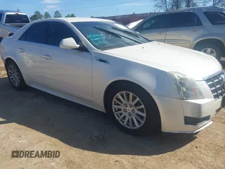 2012 Cadillac CTS Luxury with VIN 1G6DE5E54C0111985, listed as a IAAI auction lot 41662478 with 133,137 mi miles and . Bid and sale history available at DreamBid. Image 1.