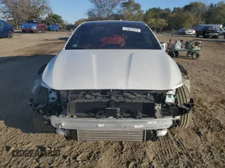 2023 Genesis G70 2.0T with VIN KMTG34TA1PU134120, listed as a Copart auction lot 77657374 with 12,024 mi miles and Salvage Title. Bid and sale history available at DreamBid. Image 5.