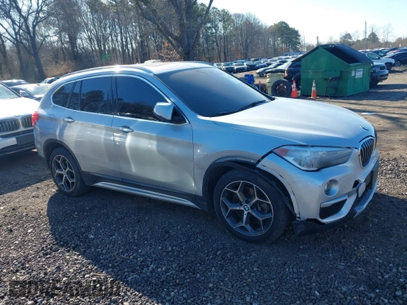 2018 BMW X1 xDrive28i with VIN WBXHT3C30J5L29757, listed as a IAAI auction lot 41879504 with 60,490 mi miles. Bid and sale history available at carsss.com. Image 13.
