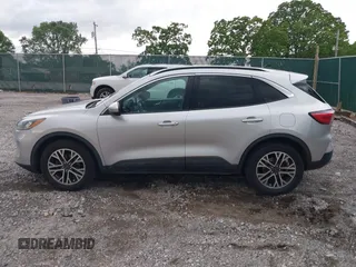 2020 Ford Escape SEL with VIN 1FMCU9H65LUA37178, listed as a IAAI auction lot 42150999 with 107,722 mi miles and . Bid and sale history available at DreamBid. Image 14.