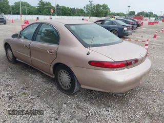1996 Mercury Sable LS z VIN 1MELM53S1TG638988, wystawiony jako IAAI lot #42523616 z przebiegiem 87 087 mil mil oraz . Historia ofert i sprzedaży dostępna na DreamBid. Obrazek 3.