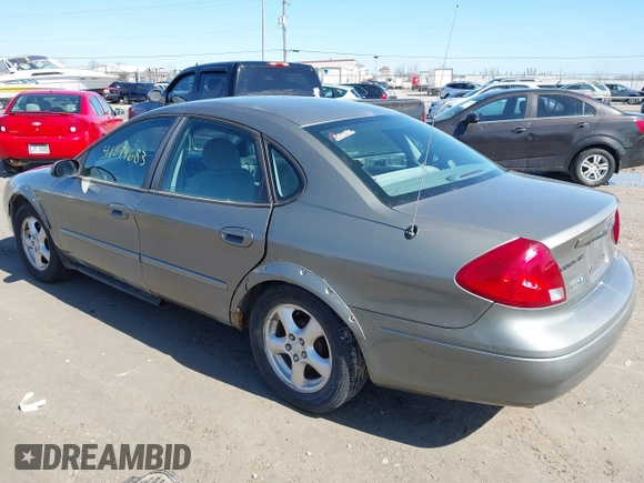 2002 Ford Taurus SES Standard with VIN 1FAFP55UX2G272540, listed as a IAAI auction lot 41874683 with 199,073 mi miles. Bid and sale history available at carsss.com. Image 3.