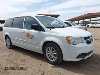 2017 Dodge Grand Caravan SE z VIN 2C4RDGBG4HR666987, wystawiony jako IAAI lot #41946734 z przebiegiem 239 683 mil mil oraz . Historia ofert i sprzedaży dostępna na DreamBid. Obrazek 13.