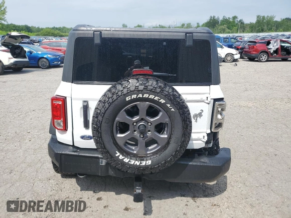 2023 Ford Bronco z VIN 1FMDE5BH2PLB20499, wystawiony jako Copart lot #62211165 z przebiegiem 28 372 mil mil oraz Szkoda całkowita • Salvage title. Historia ofert i sprzedaży dostępna na DreamBid. Obrazek 6.