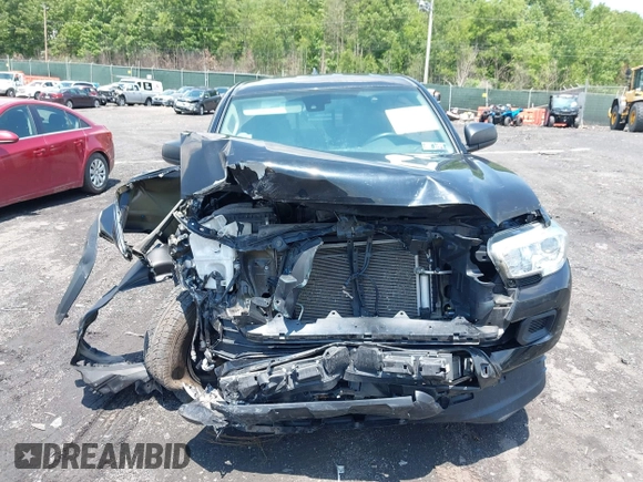 2019 Toyota Tacoma SR with VIN 5TFSX5EN7KX070319, listed as a IAAI auction lot 42475609 with 62,029 mi miles and . Bid and sale history available at DreamBid. Image 12.