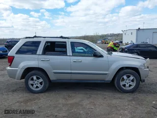 2007 Jeep Grand Cherokee Laredo with VIN 1J8GR48KX7C513145, listed as a IAAI auction lot 41994486 with 188,870 mi miles. Bid and sale history available at carsss.com. Image 13.