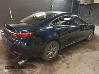 2018 Mazda Mazda6 Sport with VIN JM1GL1UMXJ1330989, listed as a IAAI auction lot 41355353 with 52,869 mi miles. Bid and sale history available at carsss.com. Image 4.