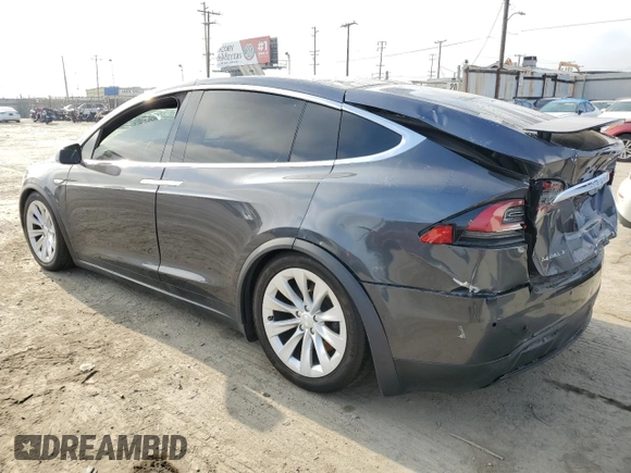 2016 Tesla Model X 70D with VIN 5YJXCAE2XGF001562, listed as a Copart auction lot 53539225 with 73,274 mi miles and Salvage Title. Bid and sale history available at DreamBid. Image 2.