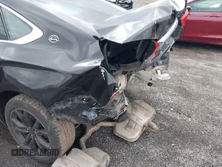 2020 Chevrolet Impala LT z VIN 2G11Z5S37L9100467, wystawiony jako IAAI lot #41812313 z przebiegiem 100 708 mil mil oraz . Historia ofert i sprzedaży dostępna na DreamBid. Obrazek 6.