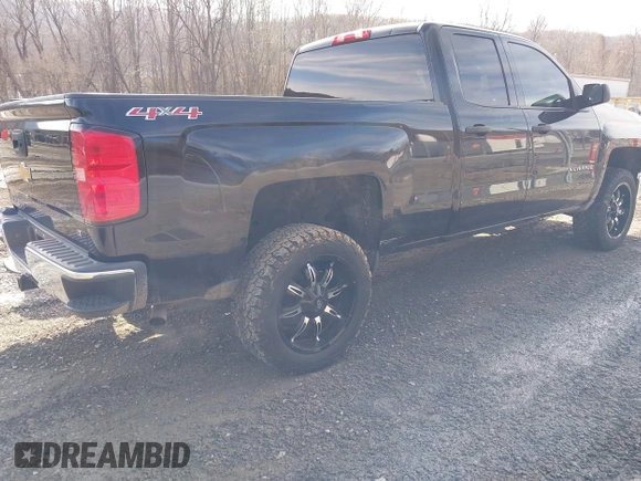 2014 Chevrolet Silverado 1500 LT with VIN 1GCVKREH4EZ338281, listed as a IAAI auction lot 41581754 with 126,786 mi miles and . Bid and sale history available at DreamBid. Image 4.
