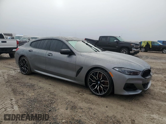 2023 BMW 8 Series M850i z VIN WBAGV8C02PCL20503, wystawiony jako Copart lot #84214214 z przebiegiem Nie podano mil oraz Szkoda całkowita • Salvage title. Historia ofert i sprzedaży dostępna na DreamBid. Obrazek 4.