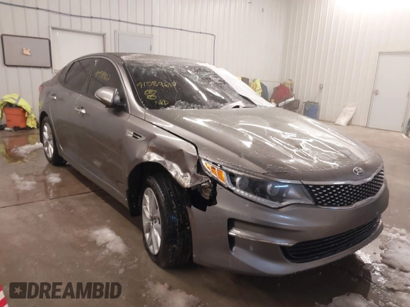 2017 Kia Optima EX with VIN 5XXGU4L36HG143321, listed as a IAAI auction lot 41589617 with 116,972 mi miles. Bid and sale history available at carsss.com. Image 1.