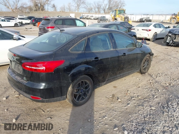 2016 Ford Focus SE z VIN 1FADP3FEXGL310270, wystawiony jako IAAI lot #40956503 z przebiegiem 156 812 mil mil oraz . Historia ofert i sprzedaży dostępna na DreamBid. Obrazek 4.