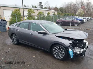 2020 Honda Insight Touring with VIN 19XZE4F98LE011149, listed as a IAAI auction lot 41834043 with 54,251 mi miles and . Bid and sale history available at carsss.com. Image 1.