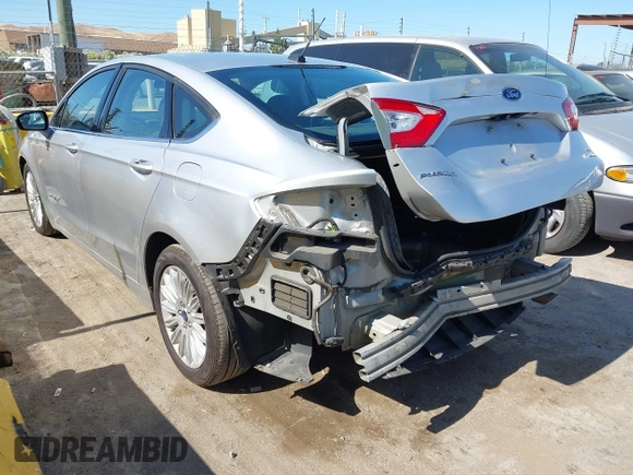 2015 Ford Fusion SE Hybrid with VIN 3FA6P0LUXFR296373, listed as a IAAI auction lot 42600980 with 76,985 mi miles and . Bid and sale history available at DreamBid. Image 3.