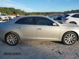 2014 Chevrolet Malibu LTZ with VIN 1G11H5SL9EF299826, listed as a IAAI auction lot 40955208 with 213,203 mi miles and . Bid and sale history available at DreamBid. Image 13.