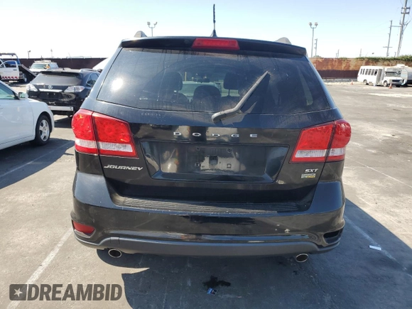 2015 Dodge Journey SXT with VIN 3C4PDCBG6FT718131, listed as a Copart auction lot 62214265 with 108,986 mi miles and Salvage title. Bid and sale history available at DreamBid. Image 6.