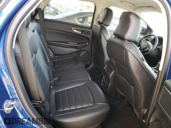 2024 Ford Edge SEL z VIN 2FMPK4J93RBA69513, wystawiony jako Copart lot #58359635 z przebiegiem 52 823 mil mil oraz Czysty tytuł • Clean title. Historia ofert i sprzedaży dostępna na DreamBid. Obrazek 11.