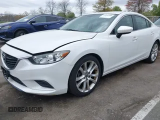 2014 Mazda 6 i Touring with VIN JM1GJ1V59E1109421, listed as a IAAI auction lot 42094480 with 153,287 mi miles. Bid and sale history available at carsss.com. Image 2.