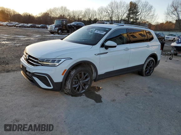 2022 Volkswagen Tiguan SE with VIN 3VV2B7AX2NM122341, listed as a Copart auction lot 86706564 with 27,709 mi miles and Salvage title. Bid and sale history available at DreamBid. Image 1.
