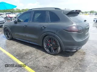2014 Porsche Cayenne GTS with VIN WP1AD2A28ELA74131, listed as a IAAI auction lot 42829362 with Not provided miles and . Bid and sale history available at DreamBid. Image 3.
