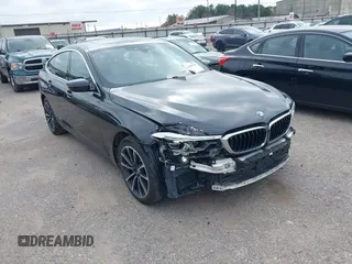 2019 BMW 6 Series 640i xDrive with VIN WBAJV6C50KBK08934, listed as a IAAI auction lot 41588796 with 61,411 mi miles and . Bid and sale history available at carsss.com. Image 1.