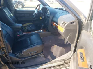 2001 Infiniti QX4 with VIN JNRDR09X21W203722, listed as a IAAI auction lot 41695963 with 123,735 mi miles and . Bid and sale history available at DreamBid. Image 5.