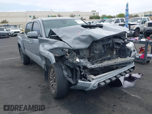 2021 Toyota Tacoma SR with VIN 3TMCZ5AN2MM405869, listed as a IAAI auction lot 42094533 with 78,449 mi miles and . Bid and sale history available at DreamBid. Image 14.