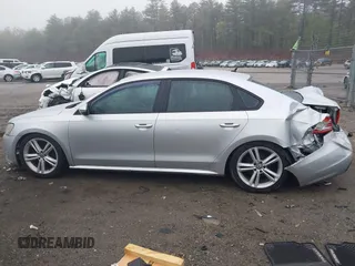 2012 Volkswagen Passat S z VIN 1VWAP7A38CC026671, wystawiony jako IAAI lot #42196429 z przebiegiem 241 904 mil mil oraz . Historia ofert i sprzedaży dostępna na DreamBid. Obrazek 14.