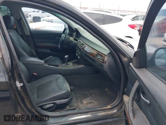 2011 BMW 3 Series 328i with VIN WBAPH7G58BNN05966, listed as a IAAI auction lot 42596914 with 166,047 mi miles and . Bid and sale history available at DreamBid. Image 5.