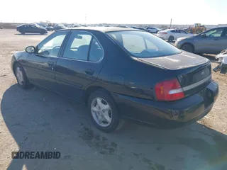 2001 Nissan Altima GXE with VIN 1N4DL01D81C220261, listed as a IAAI auction lot 41146808 with 140,840 mi miles. Bid and sale history available at carsss.com. Image 3.