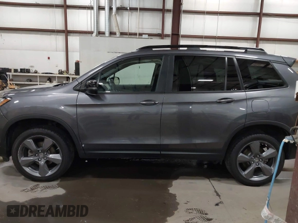 2019 Honda Passport Touring with VIN 5FNYF8H98KB007933, listed as a IAAI auction lot 41953263 with 87,614 mi miles and . Bid and sale history available at DreamBid. Image 14.