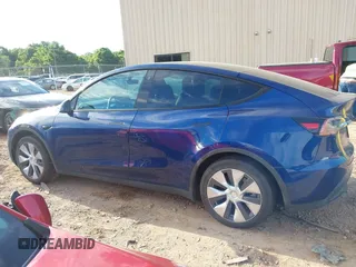 2022 Tesla Model Y Long Range z VIN 7SAYGDEE0NF429399, wystawiony jako IAAI lot #42333630 z przebiegiem 32 937 mil mil oraz . Historia ofert i sprzedaży dostępna na DreamBid. Obrazek 14.