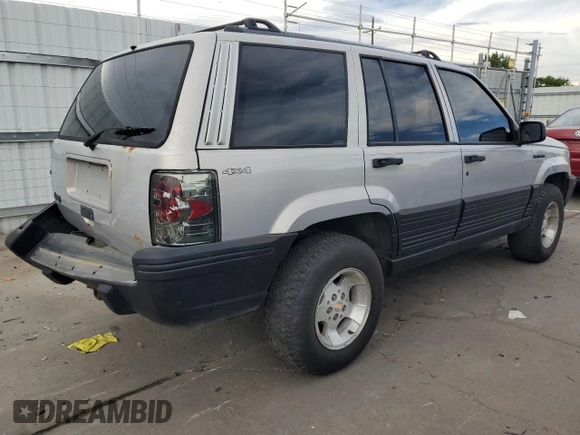 1995 Jeep Grand Cherokee Laredo with VIN 1J4GZ58S2SC703196, listed as a Copart auction lot 68571944 with 264,876 mi miles and Clean Title. Bid and sale history available at carsss.com. Image 3.