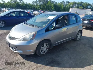 2009 Honda Fit z VIN JHMGE88289C002965, wystawiony jako IAAI lot #42382336 z przebiegiem 120 727 mil mil oraz . Historia ofert i sprzedaży dostępna na DreamBid. Obrazek 2.