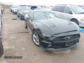 2019 Ford Mustang EcoBoost with VIN 1FA6P8TH7K5134022, listed as a IAAI auction lot 41601933 with 57,364 mi miles and . Bid and sale history available at DreamBid. Image 1.