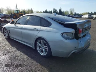 2016 BMW 4 Series 428i xDrive with VIN WBA4C9C5XGG135893, listed as a IAAI auction lot 41976541 with 86,987 mi miles and . Bid and sale history available at carsss.com. Image 3.