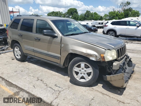2005 Jeep Grand Cherokee Laredo with VIN 1J4HR48N65C608296, listed as a Copart auction lot 58862875 with 168,421 mi miles and Salvage title. Bid and sale history available at DreamBid. Image 4.