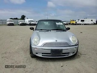 2005 MINI Hardtop with VIN WMWRC335X5TJ70165, listed as a Copart auction lot 53918445 with 145,572 mi miles and Salvage title. Bid and sale history available at DreamBid. Image 13.