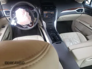 2014 Lincoln MKZ Hybrid with VIN 3LN6L2LU4ER808818, listed as a Copart auction lot 57411395 with 95,775 mi miles and Salvage title. Bid and sale history available at DreamBid. Image 8.