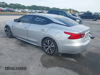 2016 Nissan Maxima SL with VIN 1N4AA6AP0GC433932, listed as a IAAI auction lot 41897180 with 91,871 mi miles and . Bid and sale history available at DreamBid. Image 3.