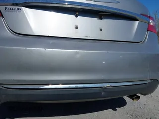 2013 Chrysler 200 Touring with VIN 1C3CCBBB4DN693621, listed as a IAAI auction lot 41738436 with 240,693 mi miles and . Bid and sale history available at DreamBid. Image 12.