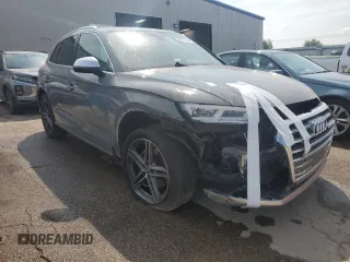 2019 Audi SQ5 Premium Plus with VIN WA1B4AFY3K2002715, listed as a Copart auction lot 64977024 with 73,762 mi miles and Salvage Title. Bid and sale history available at DreamBid. Image 4.